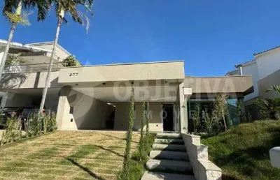 Belíssima casa nova em condomínio de alto padrão - jardins barcelona, uberlândia