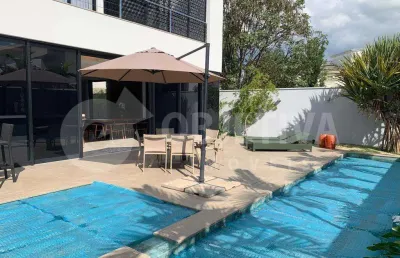Casa em condomínio à venda, 3 quartos, 3 suítes, 4 vagas, bosque karaiba - uberlandia/mg