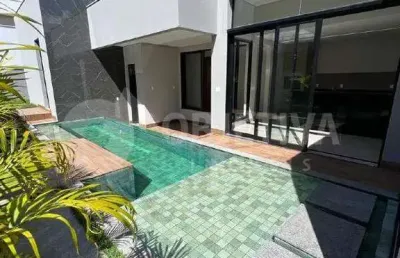 Belíssima casa à venda no condomínio alphaville 1, dentro do bairro planejado granja marileusa