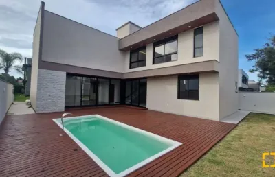 Casa alto padrão a venda em condomínio ao lado do costão golf