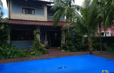 Casa com 3 dormitórios a 500m do mar no rio tavares