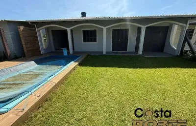 Casa mobiliada e com piscina próximo do mar em nova tramandaí