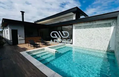 Casa térrea 4 dormitórios, suítes aconchegantes e quintal espaçoso no condomínio villas do golfe em itu interior de são paulo. uma casa cheia de luz.