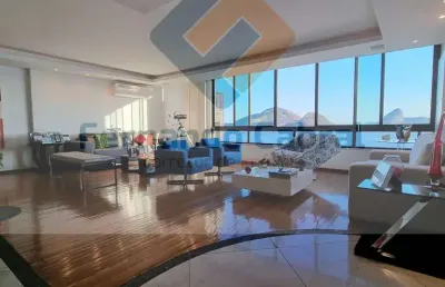 Apartamento de luxo à venda na praia de icaraí, com uma vista deslumbrante da praia e do rio.