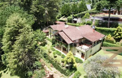 Casa com 6 dormitórios à venda, 478 m² por r$ 3.800.000,00 - vila porã - campos do jordão/sp