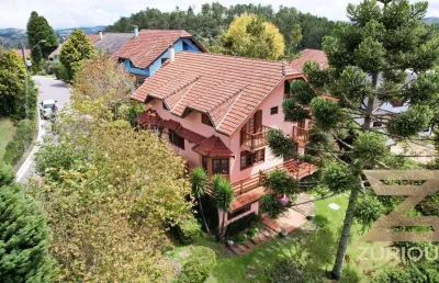 Casa com 6 dormitórios à venda, 386 m² por r$ 3.950.000,00 - alto do capivari - campos do jordão/sp