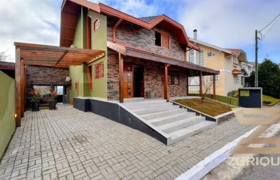 Casa com 4 dormitórios à venda, 155 m² por r$ 1.370.000,00 - altos do capivari - campos do jordão/sp