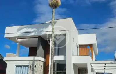 Casa frente ao mar na praia da daniela. com 5 dormitorios, 6 banheiros, 3 vagas de garagem, piscina e muito mais! codigo: 129672