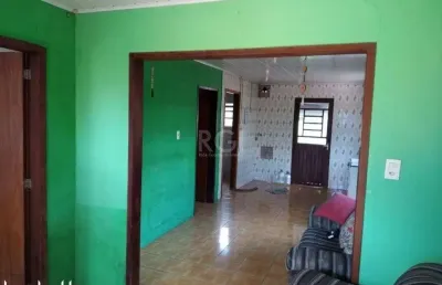 Boletto imóveis vende terreno 363m², com 2 casas por r$250.000,00, em cachoeirin