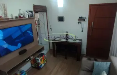 Venda de apartamento em santos com 2 quartos a duas quadras da praia do embaré em santos / sp