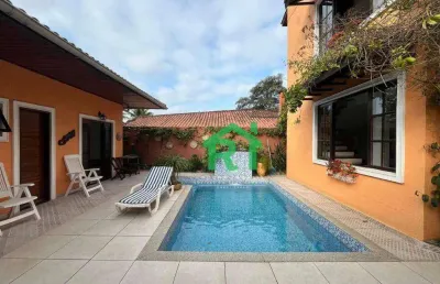 Casa à venda na praia da enseada | rocha imóveis guarujá