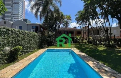 Casa à venda na praia da enseada | rocha imóveis guarujá