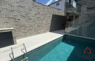 Casa com 3 quartos à venda na delphin moreira, 99, embaré, santos por r$ 1.800.000