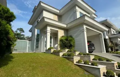 Sobrado a venda em condomínio fechado com três suítes no bairro américa  - joinville/ sc