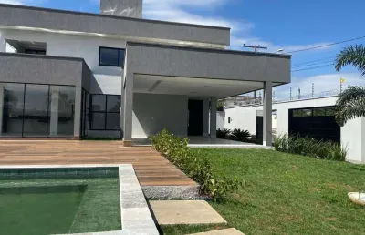 Vendo sobrado de alto padrão  com 4 suite, sala pé direito duplo, área gourmet e piscina com cascat
