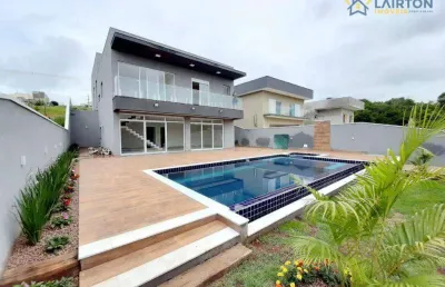 Deslumbrante casa de 4 suítes à venda por r$ 1.799.000 com piscina borda infinita e vista para área verde – terra preta, mairiporã/sp