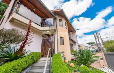 Casa com 4 quartos à venda na rua madre maria dos anjos, 1559, água verde, curitiba por r$ 1.900.000