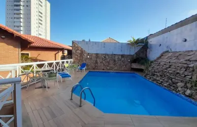 Casa com 3 dormitórios à venda, 275 m² por r$ 2.750.000,00 - solemar - praia grande/sp