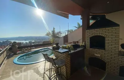 Casa com 4 quartos à venda na rua aldo luz, 200, itaguaçu, florianópolis, 376 m2 por r$ 2.200.000