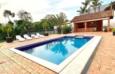 Casa de luxo com área de lazer completa no condomínio mais exclusivo de juiz de fora