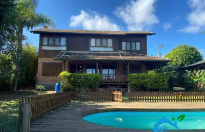 Casa a venda na ponta da piteira, vista ampla para lagoa.ibiraquera/sc.