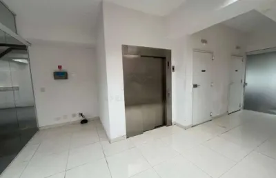 Sala para alugar, 89 m² em condomínio com elevador.