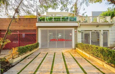 Sobrado sofisticado com área gourmet - 5 dormitórios sendo 1 suíte com 2 vagas de garagem - 231m² de área construída e 169m² de terreno
