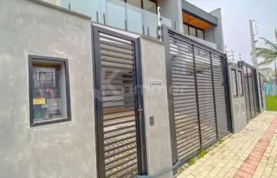 Excelente sobrado 3 suítes, a poucos melhor do mar em balneário piçarras.