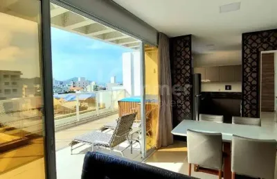 Cobertura duplex com 3 suítes a venda em canto grande, a 200 metros do mar com jacuzzi