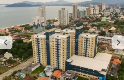 Apartamento à venda em balneário piçarras-sc, itacolomi: 2 quartos, 1 sala, 1 banheiro, 1 vaga - 63,00m² de área.