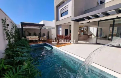 Casa com 3 dormitórios à venda, 260 m² por r$ 2.500.000,00 - condomínio reserva dos ipês - uberlândia/mg