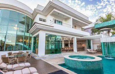 Casa alto padrão no condomínio gênova com quatro suítes e área gourmet completa.