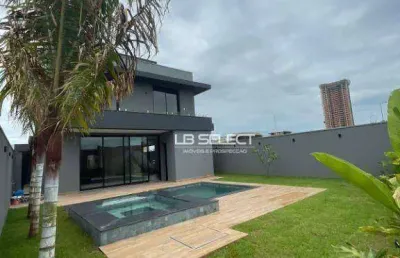 Casa no condomínio tamboré com quatro suítes, a máster com closet e área gourmet completa.