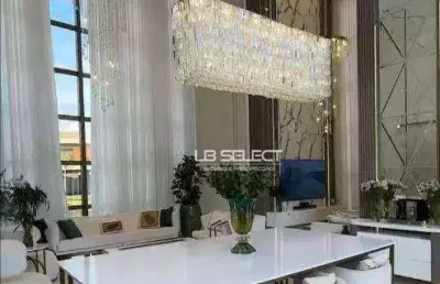 Casa luxuosa no condomínio versailles com quatro suítes e área gourmet completa.