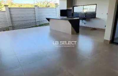 Casa no condomínio terras alpha com três suítes e área gourmet completa.