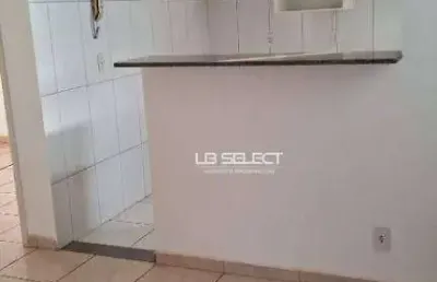 Apartamento no bairro shopping park com dois quartos, banheiro social e uma vaga de garagem.
