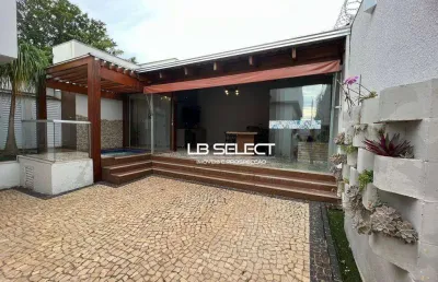 Casa no bairro laranjeiras com três suítes e varanda gourmet.