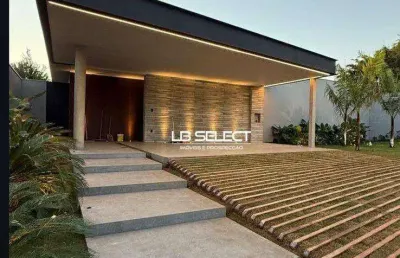 Mansão no condomínio gávea hill com quatro suítes e varanda gourmet completa.