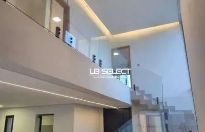 Casa no condomínio terras alpha com três suítes e varanda gourmet.