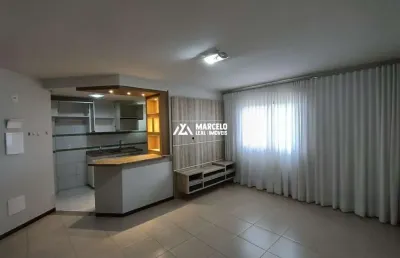 Vendo apto de 2/4 sendo 01 suíte com móveis planejados e 02 vagas no 7º em condo