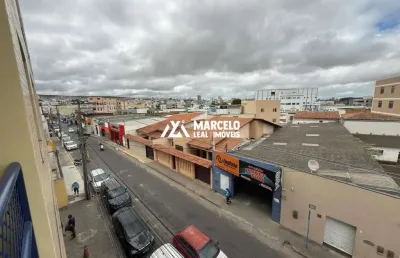 Alugo grande apto com garagem coberta na região central de vitória da conquista,