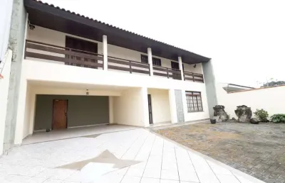 Casa com 3 quartos para alugar na Rua Juscelino Gonçalves, 41, São Braz, Curitiba