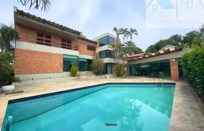 Casa em condomínio fechado com 4 quartos para alugar na alameda guarujá, 782, alphaville, santana de parnaíba por r$ 22.700