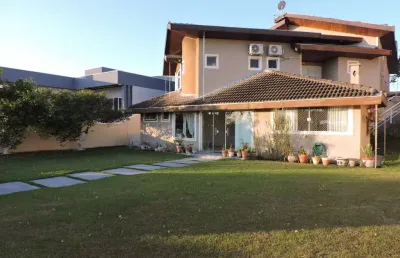 Mirante - casa térrea com 4 suítes em lote de 1.000 m²