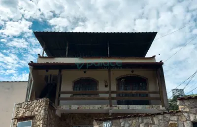 Casa a venda no bairro bandeirantes de três quartos sendo um suite.