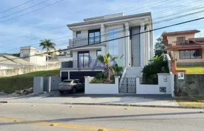 Casa com 4 quartos à venda na avenida dos lagos, 2, pedra branca, palhoça por r$ 2.950.000