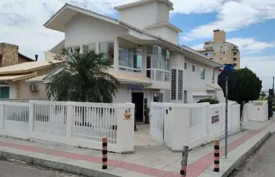 Casa com 4 quartos à venda na rua varese, 83, pagani, palhoça por r$ 2.100.000