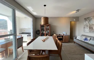 Apartamento à venda em ubatuba mobiliado com sacada gourmet 2 garagens e 2 suítes piscina e churrasqueira