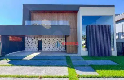 Casa com 4 dormitórios à venda, 460 m² por r$ 4.775.000,00 - condomínio reserva do paratehy - são josé dos campos/sp