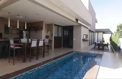 Casa em condomínio fechado com 4 quartos à venda no jardim sul, uberlândia  por r$ 2.600.000
